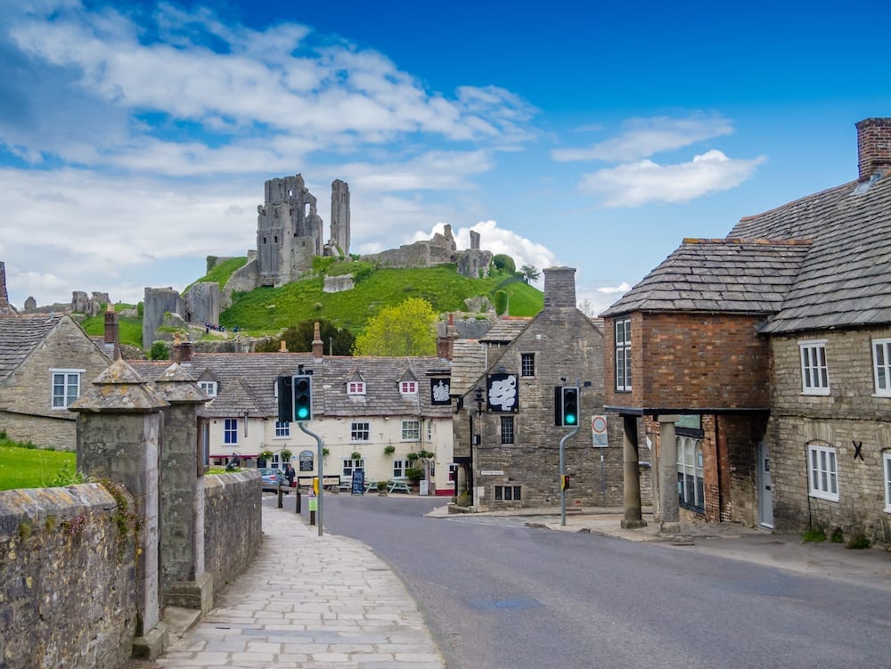Corfe Castle and village in Dorset where you can find a dog friendly pub - The Bankes Arms