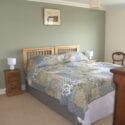 High House in Suffolk is dog friendly. Master bedroom
