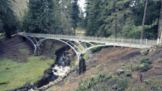 The Iron Bridge, which spans the Debdon Burn at Cragside, near Rothbury in Northumberland