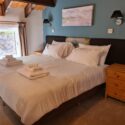 Comfy bedroom at the Lodges in Scotland that welcomes dogs