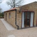 Parking directly in front of Daisy Cottage on the gravel area. This area is fully enclosed.